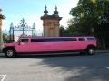 roze Hummer H2 limousine huren